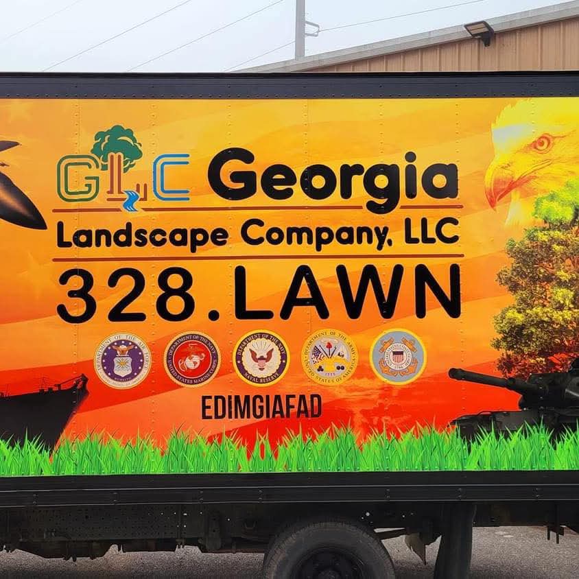 Orange box truck wrap reading GLC Georgia Landscape Company, LLC, 328.LAWN